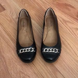 Black flats with silver buckle
